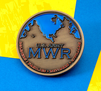 Antiqued bronze U.S. Army MWR challenge coin featuring a blue globe map and organizational text against a yellow and blue background.