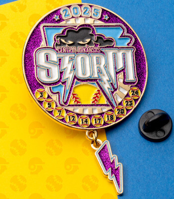 Enamel trading pin for Central Arkansas Storm 2025 featuring a softball, storm cloud, and lightning bolt dangle on a purple glitter background.