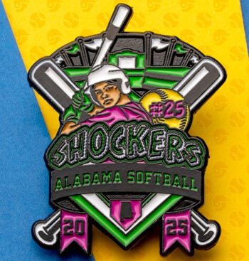 Enamel lapel pin for Shockers Alabama Softball featuring a player, crossed bats, and a stadium design on a blue and yellow background.