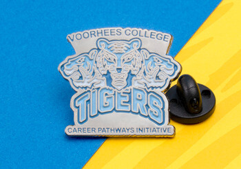 Enamel lapel pin featuring the Voorhees College Tigers logo with three tiger heads and a blue color scheme.